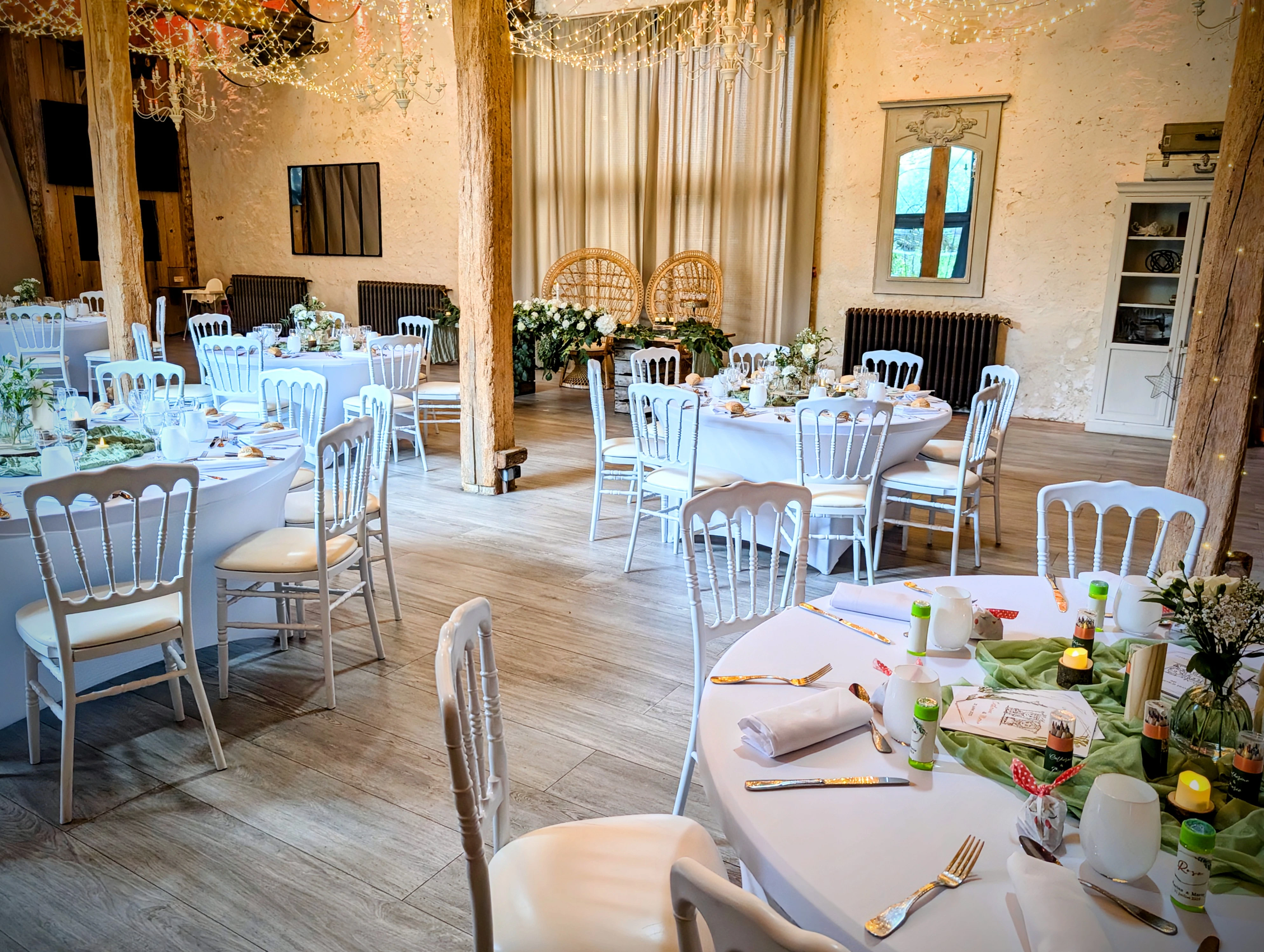 A colorful mask lying on a floor covered in confetti.